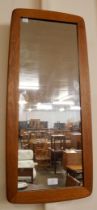 A teak rectangular framed mirror