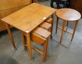 A Poul Hundevad teak nest of tables