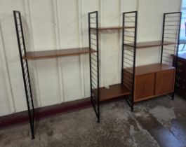 A Staples Ladderax teak room divider