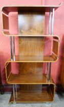 A walnut and chrome four tier room divider