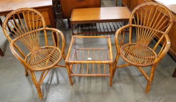 A pair of Italian bamboo chairs and a coffee table