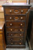 A 19th Century American Amberg beech seven drawer index filing cabinet