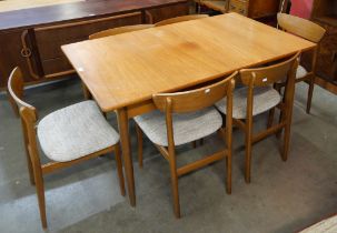 A teak dining table and six chairs