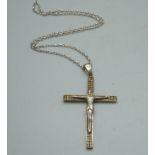 A silver gilt crucifix set with cubic zirconia, on a silver chain, 14g, pendant length 7.5cm