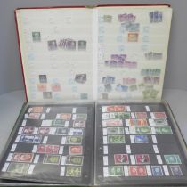 Stamps; East and West German stamps in two stock books
