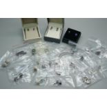 Twenty-five pairs of silver and silver mounted earrings