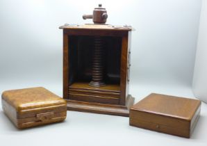 A wooden flower press, a Karelian birch cigarette box and a wooden pocket watch box