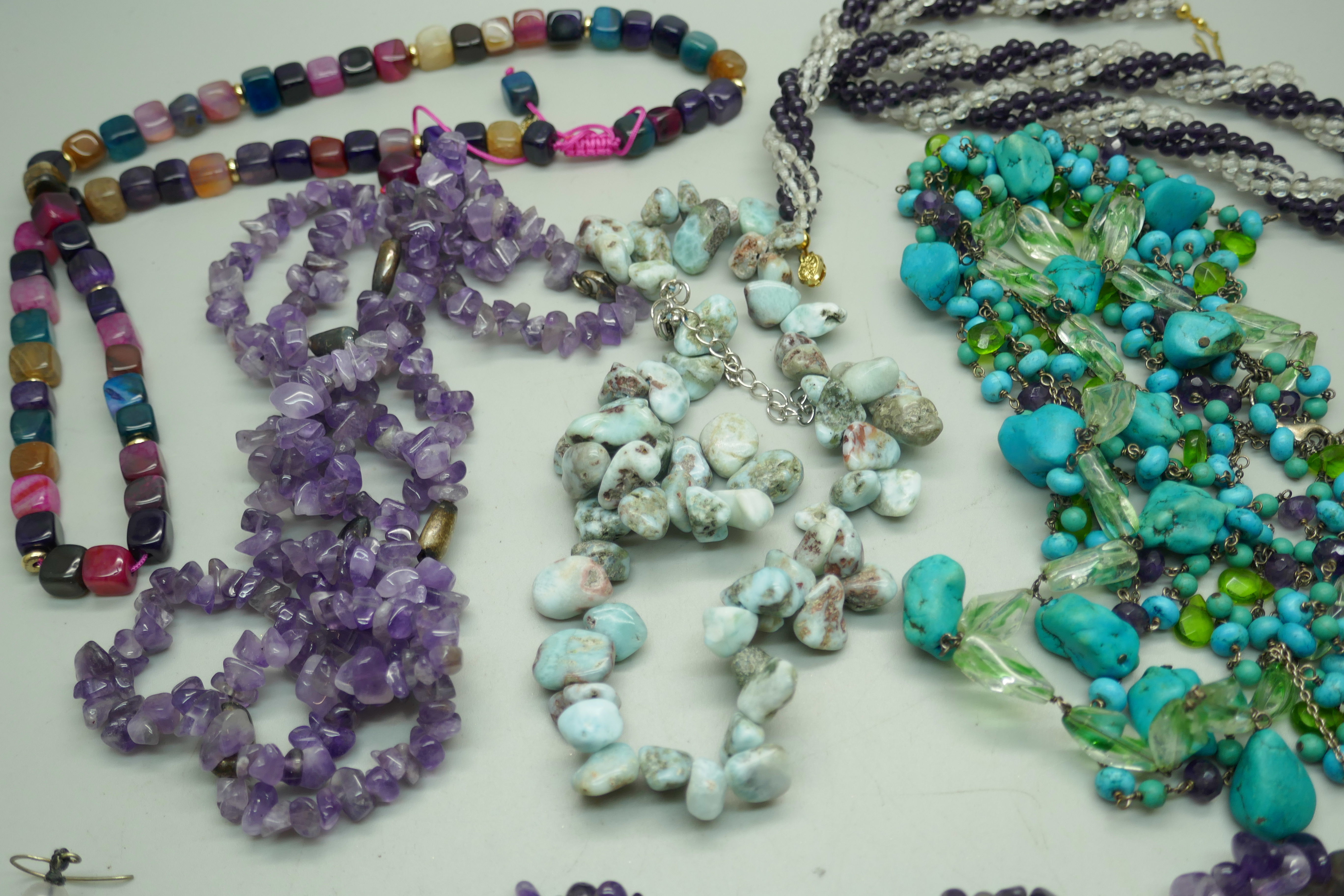 A turquoise seven strand necklace with silver clasp, two amethyst necklaces, one with earrings, a - Image 3 of 3