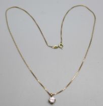 A yellow metal diamond simulant pendant on a 9ct gold chain, 2.1g, 41.5cm