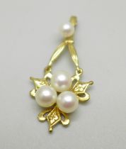 A yellow metal and pearl pendant, marked 14K, 2.1g