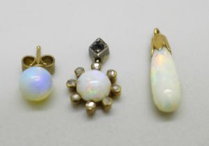 A yellow metal and opal drop pendant, a diamond and opal pendant and one opal earring