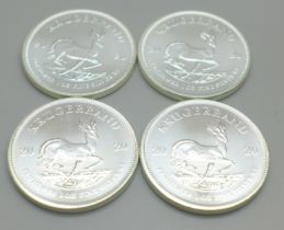 Four 2020 1oz fine silver Krugerrands