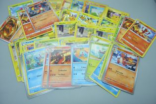 Sixty Pokemon cards including vintage cards Red Cheek Pikachu, Charmander, Squirtle, etc.