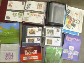 Stamps; a box of GB stamps, covers, presentation packs, 1994 year book, etc.