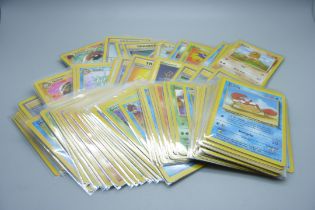 Ninety vintage Pokemon cards, sets Fossil, base set, Rocket, Jungle, etc.