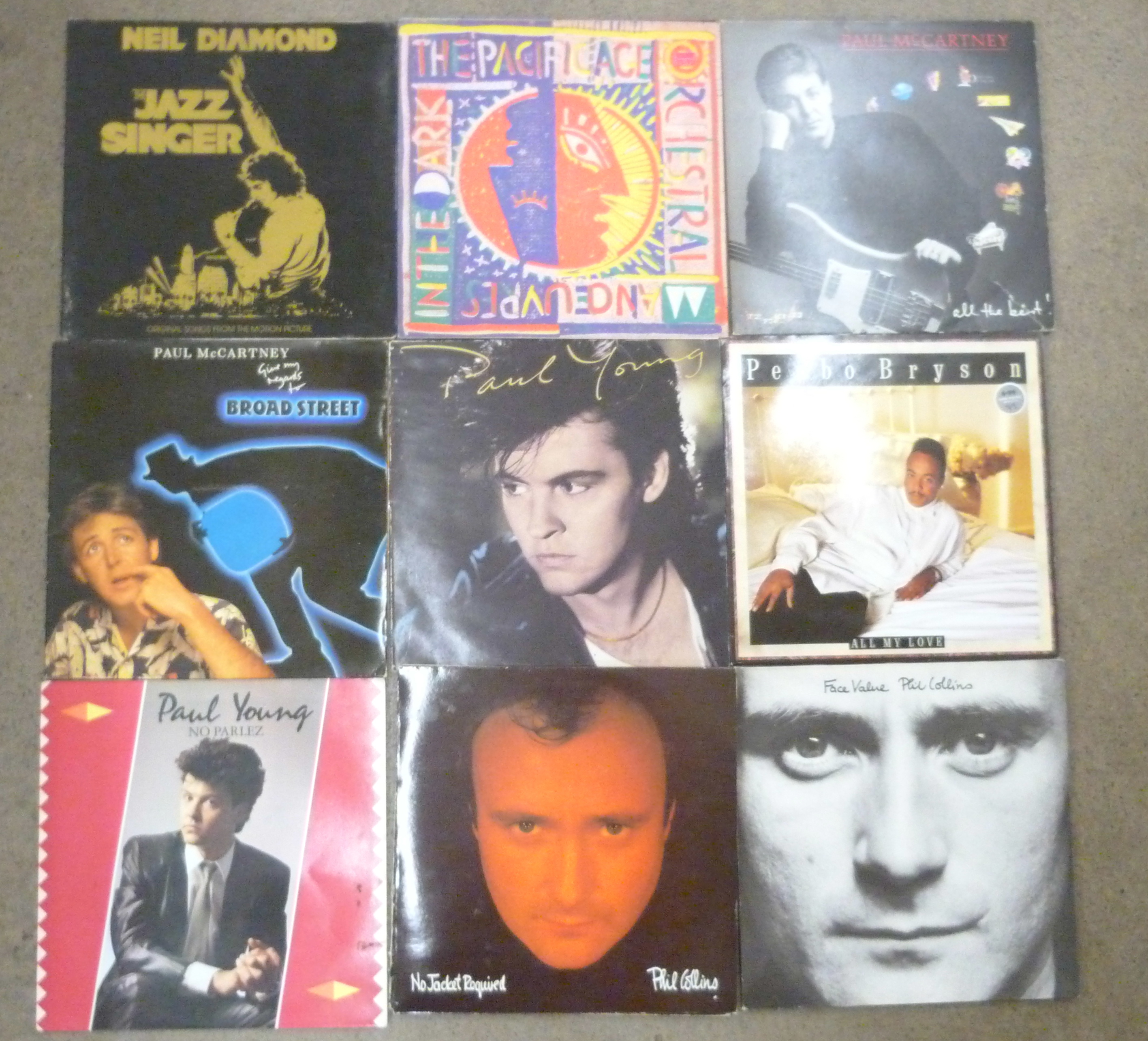 A box of LP records, Paul McCartney, Wings, Rod Stewart, Santana, Steve Harley, Thin Lizzy, etc.