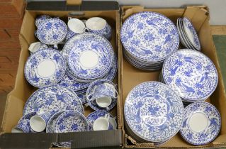 A large collection of Noritake blue and white dinner and teawares, tea cups, coffee cups, soup