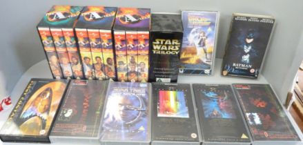 A vintage set of VHS tapes including A-Team, Star Wars, Back To The Future, Star Trek, The