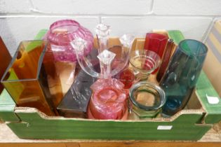 A collection of coloured glass vases and a clear glass candelabra **PLEASE NOTE THIS LOT IS NOT