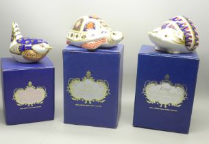 Two Royal Crown Derby paperweights; wren and hedgehog, both with silver stoppers and tortoise with