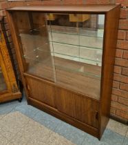 A Herbert Gibbs tola wood bookcase