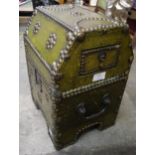 A continental green leather and brass mounted chest