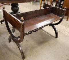 A 19th Century French faux rosewood double sided book table