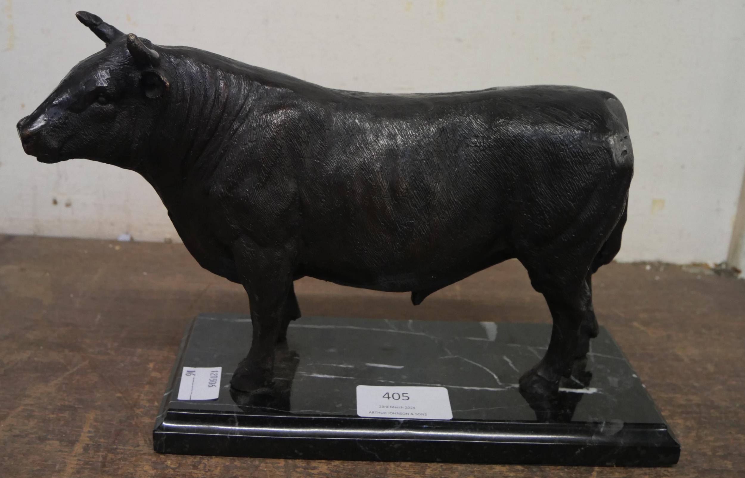 A bronze figure of a bull