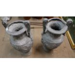 A pair of Victorian Romanesque lead garden urns