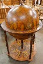 An Italian terrestrial globe cocktail cabinet/trolley