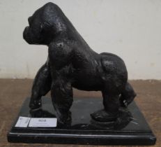 A bronze figure of a gorilla