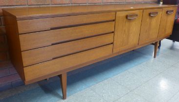 A Beautility teak sideboard