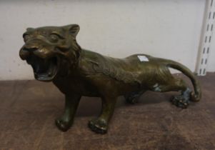 An oriental bronze figure of a tiger