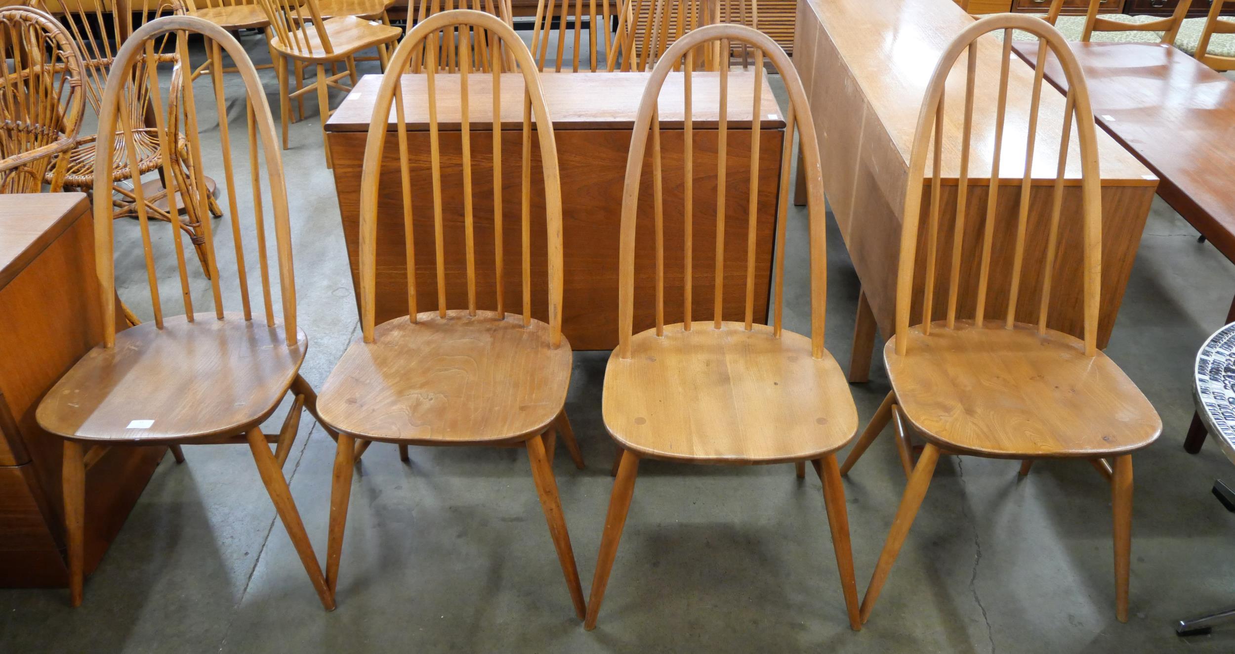 A set of four Ercol blonde elm and beech Quaker chairs