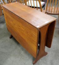 A G-Plan Fresco teak drop-leaf table