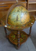 An Italian terrestrial globe cocktail cabinet/trolley