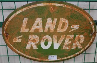 An enamel Land Rover sign