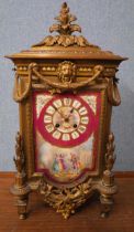 A French Empire style gilt wall clock