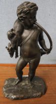 A bronze figure of a cherub