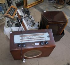 A vintage radio and radio parts, dials, speakers, transformers, etc.