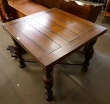 An oak draw-leaf table