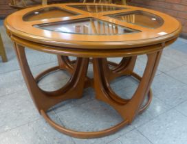 A G-Plan teak and glass topped circular nest of tables