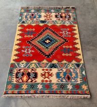 A Turkish muti coloured rug, 169 x 247cms