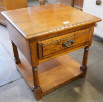 A George III style Ipswich oak single drawer lamp table