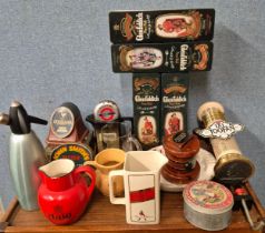 A collection of breweriana, including; beer tap, ash trays, etc.