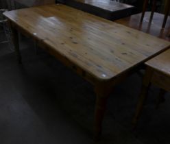 A Victorian style pine two drawer farmhouse kitchen table