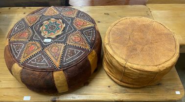 Two Moroccan leather pouffes