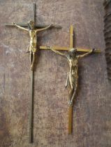 A pair of brass crucifixes