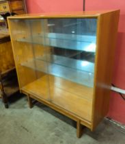 A Turnidge of London teak display cabinet