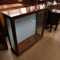 An oak museum display cabinet